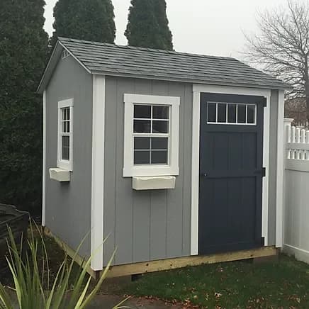 White PVC trim detail on a completed shed